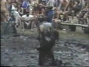Nude ladies mud wrestle